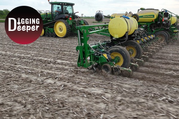 John Deere planter and tractor running in the field with Digging Deeper logo